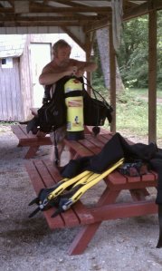 Scuba Steve Gardner gets his diving gear ready at an Indiana quarry.