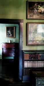 Books and paintings fill the home